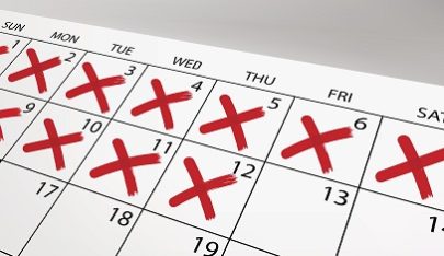 Calendar with days crossed off.
